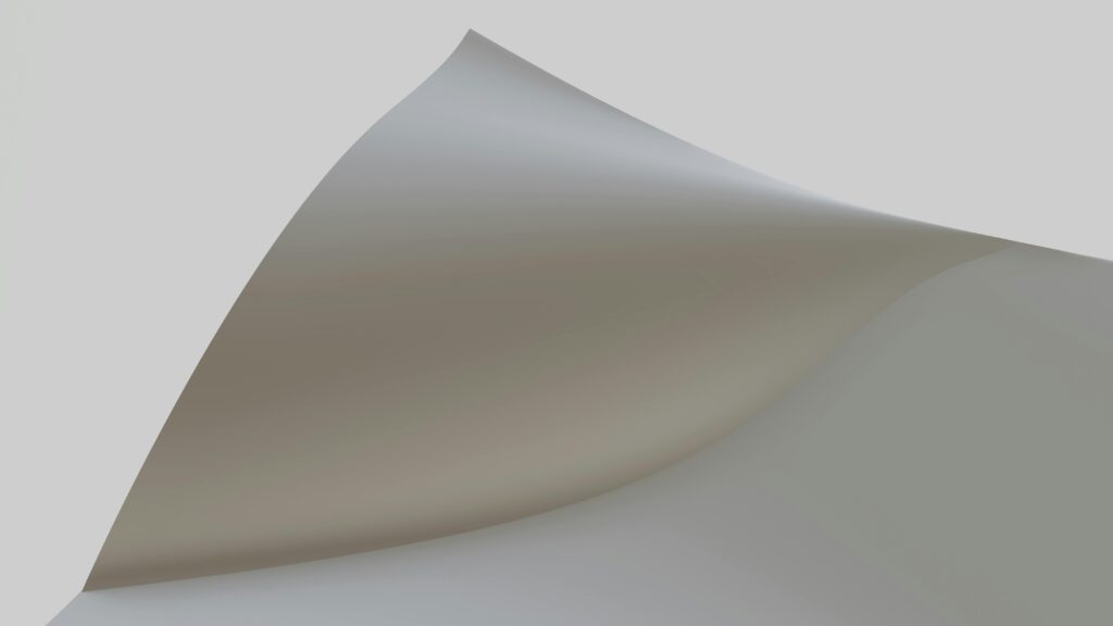 Papier Abstract minimalist artwork featuring a curved paper sheet against a white background.